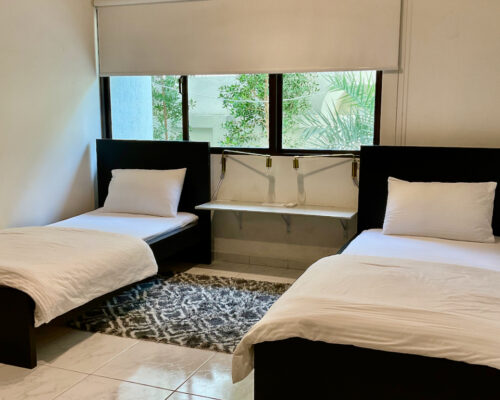 a bedroom in holiday villas in dubai for family vacation and business meetings